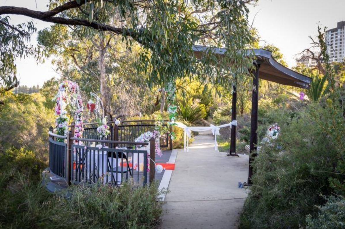 Bushland walkway styled with floral arbours